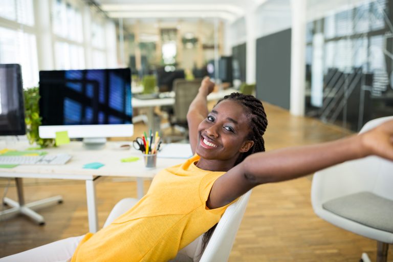 Female graphic designer in cheerful mood